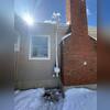 Exterior vent piping was installed to safely exhaust air above the home and support improved radon reduction performance throughout both foundation areas.