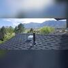 The radon exhaust protruding from the garage roof.