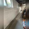 Our installed interior drainage system keeps water from pooling across the basement floor.