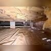 Notice the falling insulation. A sign of high humidity that can weaken joists and beams.