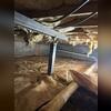 Here you can see a close up of one of our SmartJacks and Supplemental beam installed in this crawl space.