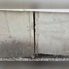Over time, separation developed at the joint between two poured concrete foundation wall sections. Our inspection determined this condition was the result of approximately 2.5 inches of differential settlement occurring along one side of the home. Left uncorrected, this ongoing movement would allow...