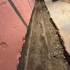 This photo shows the issues that existed before the renovation, including excessive moisture and the risk of water infiltration, which could cause long-term damage to the foundation and basement materials.