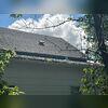 During the inspection, the damage extended to the gutters, asphalt shingles, and the fascia.