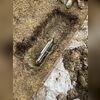 This earth anchor is installed into stable soils several feet away before a galvanized steel rod attaches the earth anchor and wall anchor.