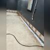 This trench will soon host a system designed to keep your basement dry for years.