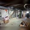 The existing wooden support posts were structurally inadequate to carry the imposed loads from the floor system above, resulting in deflection and noticeable sagging of the floors.