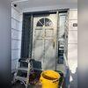 We are preparing to replace the original wooden door with a new Harvey Industries Model SF door.