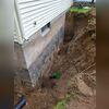 In order to stabilize this crumbling foundation, we first had to dig up the whole exterior of the home to find the original source of deterioration.