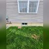 Tis home had a regular sliding window letting very little light in and no exit route in an Albany, NY basement.