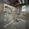 Water intrusion and failing walls created a dangerous combination.