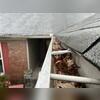 The house was surrounded by gutters that all looked just like this. Full of leaves and damaging debris, forcing water to sit in the gutters. This will cause overflow and erosion of a metal gutter.