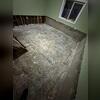 These exposed foundation walls had leaked for many years, causing much frustration for this family, and rendering their basement nearly useless.