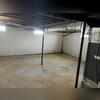 This wet basement had a musty scent. This photo was taken upon the initial inspection.