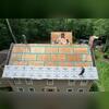 The Crew seales the plywood seams, and began installing protective underlayment for a stronger roof foundation.