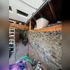 The fieldstone foundation wall had undergone progressive deterioration, resulting in structural cracking and inward displacement of the wall.