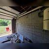 The homeowner began noticing signs of foundation movement in the garage, including a prominent horizontal crack running across the concrete block wall. Horizontal cracking is often a warning sign of excessive soil pressure pushing against a foundation wall from the outside. Left unaddressed, this...