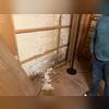 This basement wall was showing clear signs of long-term moisture intrusion. As water seeped through the concrete block foundation, it left behind white mineral deposits known as efflorescence, causing the wall coating to bubble, peel, and deteriorate. The staining and crumbling material visible...