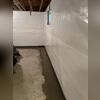 We installed a SmartPipe Drainage System beneath the floor to capture water and drain it to the sump. A CleanSpace Wall System was put up to do the same for the wall moisture!