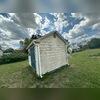 Before the wash, years of built-up dirt and grime had taken over the side of this shed, leaving it looking weathered and worn.