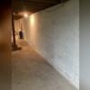 This shot shows the basement before any intervention by Fortress.