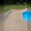 The small white marks on the concrete are where Woods injected the PolyLevel. As you can see, the concrete slabs are now level and flush.