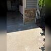 If you look closely at the stone wall, the driveway is back it its rightful place.