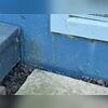 Water line at the exterior of the foundation leading into the basement.