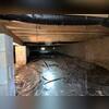 This photo was taken before repairs. The wood was in pretty good condition, but the homeowner wanted the space encapsulated to keep the wood in good condition. The smells were also a problem for the homeowner.