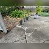 Multiple cracks and deteriorated concrete surfaces were visible across this backyard patio before concrete leveling and crack repair services were completed in Laguna Niguel, CA.