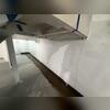 We sealed the walls with a durable wall vapor barrier to reduce humidity in the basement.