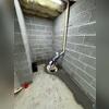 The TripleSafe sump pump is installed, providing multiple layers of protection. Primary, secondary, and battery backup pumps ensure that the basement stays dry no matter the weather.