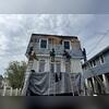 Brown Roofing starts by protecting the home, windows, and landscaping before the new roofing system goes on.