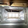 Securing the window in our EverBrace system.