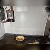 A sneak peek at the sump pump during installation, part of a complete waterproofing solution.