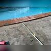 Parts of the pool area were sunken, causing tripping hazards.