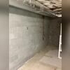 In this photo you can see the wall before repairs.