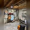 The home's existing sump pump was a makeshift system that did not provide adequate groundwater control. Upon failure, groundwater infiltration occurred through the foundation drainage system, resulting in basement seepage and increased humidity levels. The uncovered sump basin further contributed...