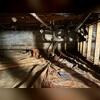 This crawl space is caked with mud, dirt, and grime from years of moisture accumulating in the environment.