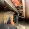 2 Fortress team members working together to install a Smart Jack in a crawl space in Inwood, West Virginia