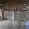 Efflorescence seen on the walls, a telltale sign of water intrusion.
