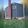 The new ProVia CedarMAX vinyl siding gives this side of the home a clean, finished look while protecting the exterior from weather, moisture, and everyday wear.