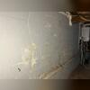 The concrete walls in this basement had clearly been damaged by water intrusion. Something needed to be done so water would no longer seep through the concrete blocks and into the basement.