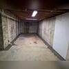We installed our WaterGuard subfloor drains in the coves of the basement. We also placed the second sump pump system in this opposite corner of the basement.