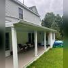 39 feet of white Gutter Shutter Installed on back porch roof.&nbsp;
