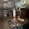 The masonry support column had deteriorated to the point that it could no longer adequately carry the structural load of the floor system above. As its load-bearing capacity diminished, the floor framing experienced excessive deflection, resulting in noticeable sagging and a bouncy or uneven feel...