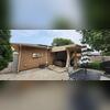 The radon exhaust exiting the home from the crawlspace.