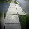 The homeowner faced a challenging issue with their uneven walkway and sidewalk, causing potential safety concerns.