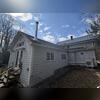 Before the team installed 5-inch seamless gutters, and downspouts
