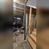 The existing temporary support post was serving as an unintended long-term load-bearing element. Because the floor framing system was not properly stabilized or structurally reinforced, the unsupported loads contributed to deflection and sagging of the floors above.